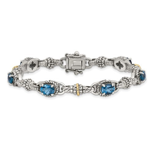 Sterling Silver with 14K Accent 7.25 Inch Antiqued Oval London Blue Topaz Bracelet