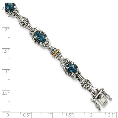 Sterling Silver with 14K Accent 7.25 Inch Antiqued Oval London Blue Topaz Bracelet