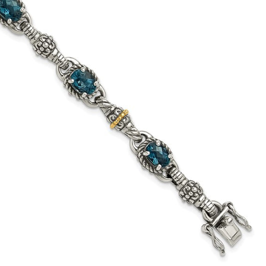 Sterling Silver with 14K Accent 7.25 Inch Antiqued Oval London Blue Topaz Bracelet