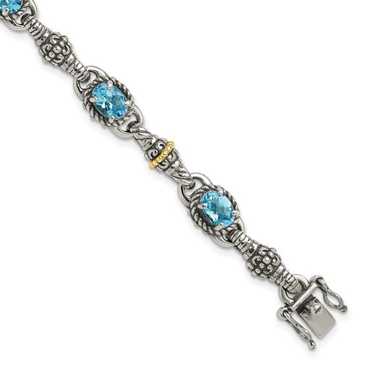 Sterling Silver with 14K Accent 7.25 Inch Antiqued Oval Swiss Blue Topaz Bracelet